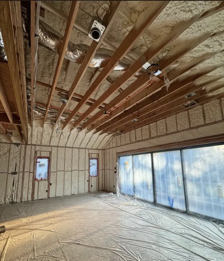 Interior walls and ceiling insulated with spray foam during new construction in Middleburg